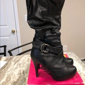 Size 8 high heel boots.